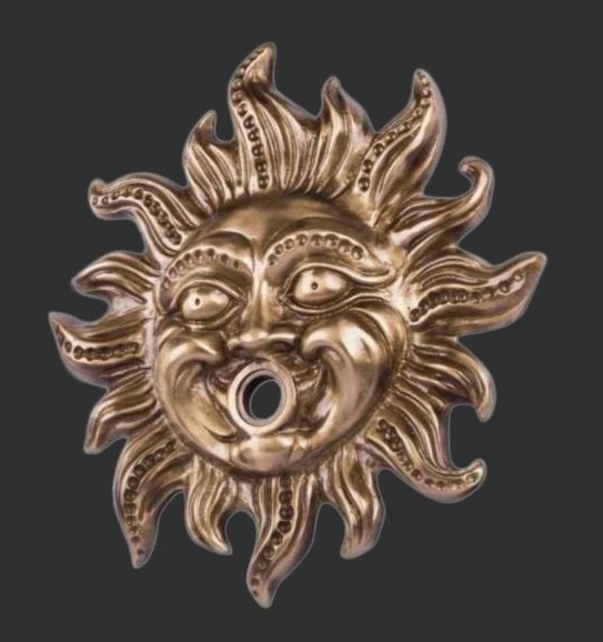 Sun face in brass for water spout